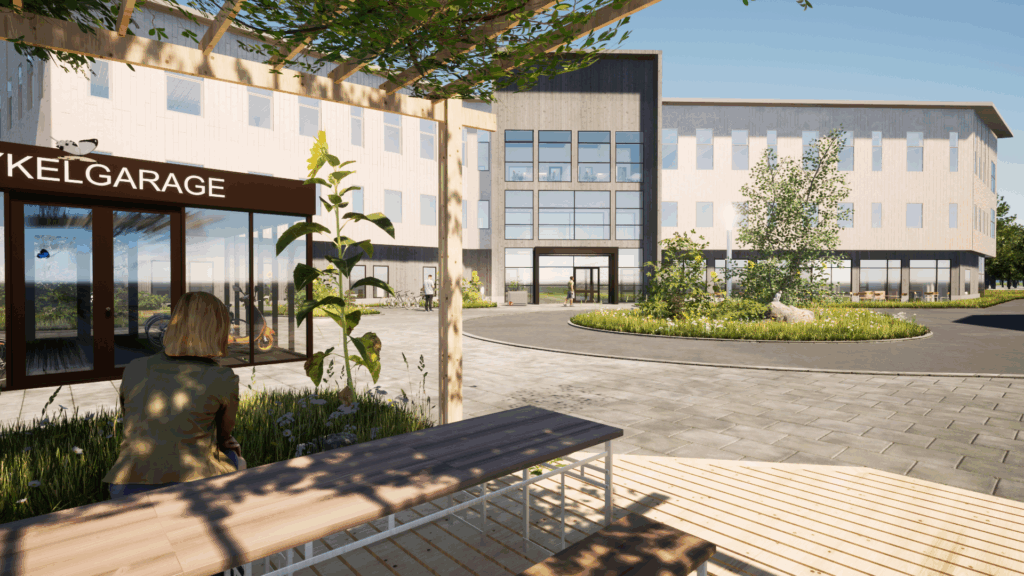 Ett stilrent kontorshus i tre våningar med varm träfasad omgivet av grönt och stående under en blå himmel med lätta moln som ger ett öppet och inbjudande intryck. I förgrunden syns en kvinna sitta på en bänk under en skuggad paviljong.